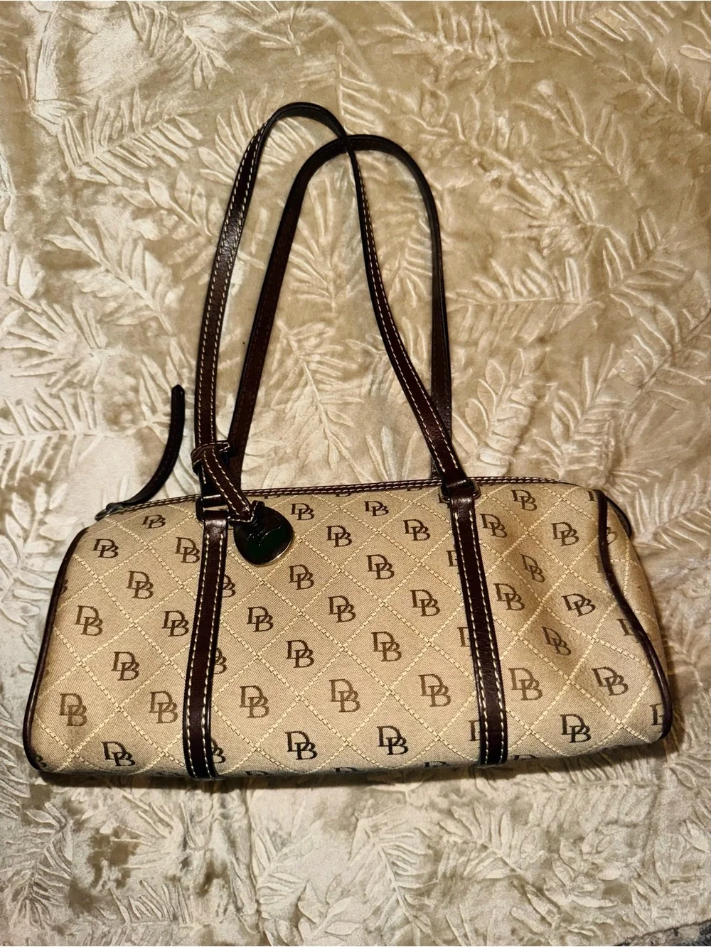 Dooney & Bourke Beige Logo Quilted Barrel Shoulder Bag with Brown Trim